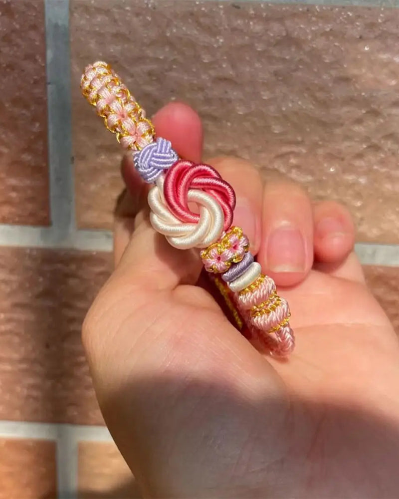 Bracelet with knot of peach blossoms