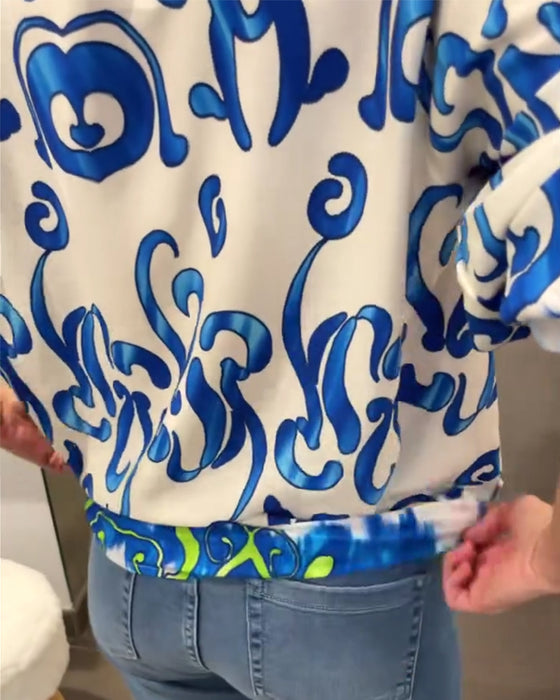 Elegant long-sleeved top with printed V-neck