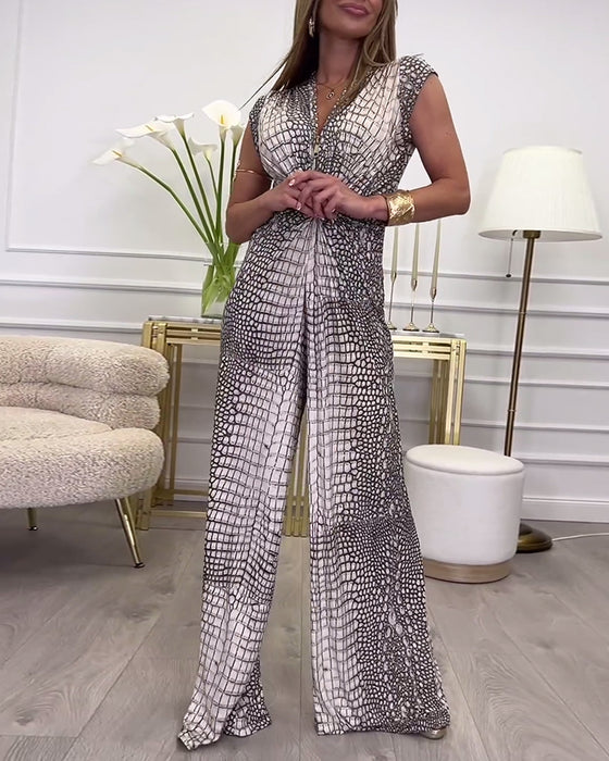 Deep V twist printed sleeveless jumpsuit