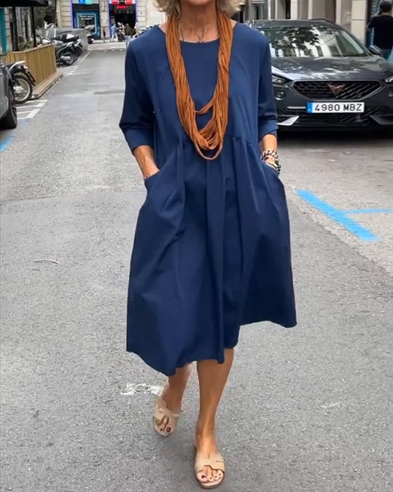 Round neck dress with pockets