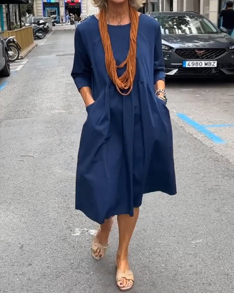 Round neck dress with pockets