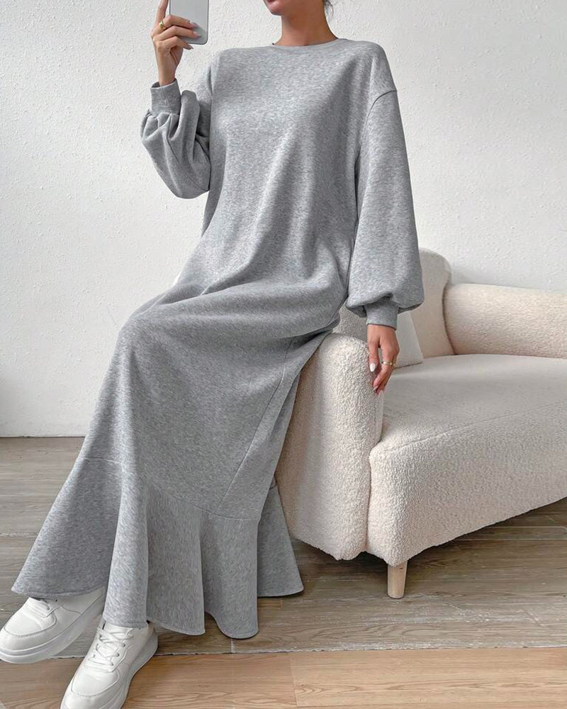 Loose dress with long sleeves and pockets