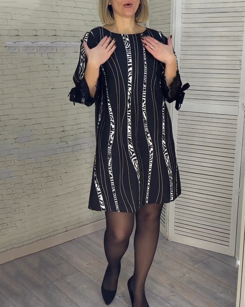 Knee-length striped dress