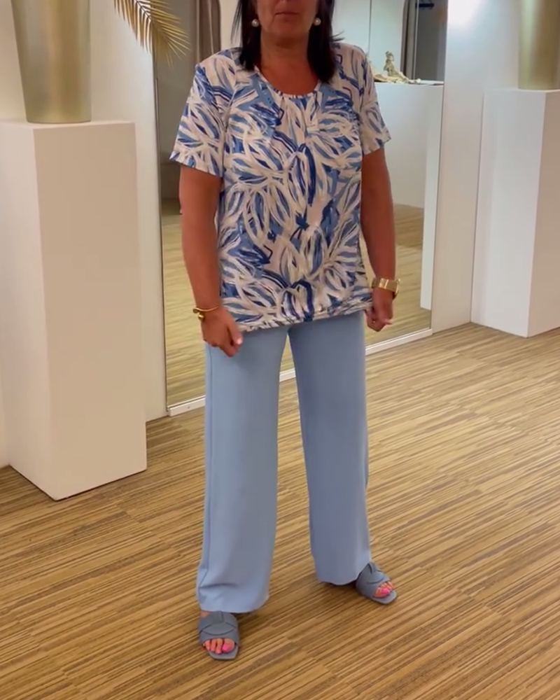 Printed short-sleeve round neck pleated blouse