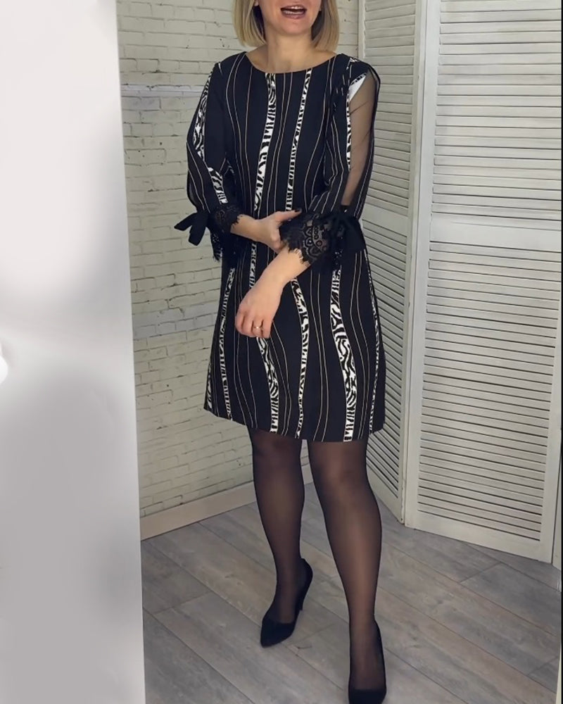 Knee-length striped dress
