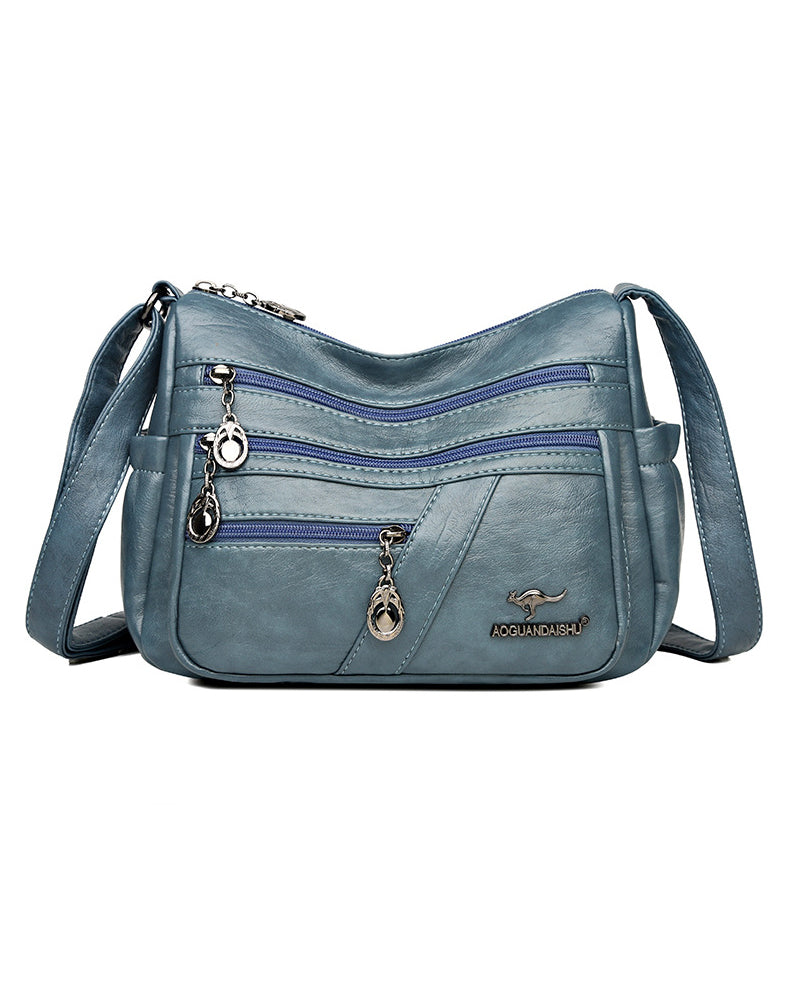 Multi-pocket soft leather crossbody bag
