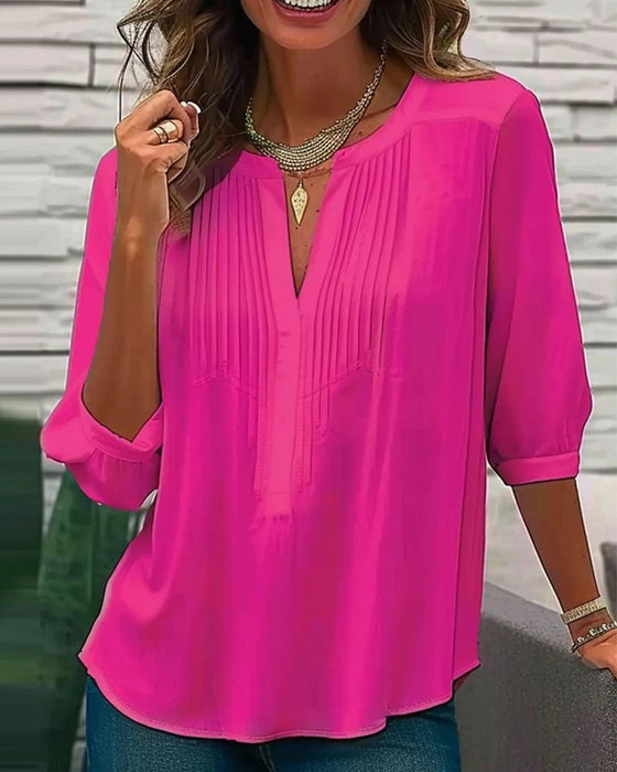 V-neck pleated solid color blouse
