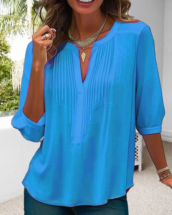 V-neck pleated solid color blouse