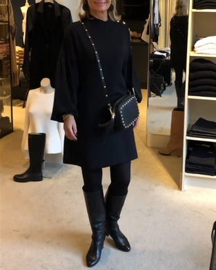 Classic black dress with lantern sleeves