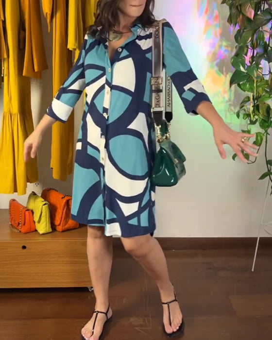 Long-sleeved buttoned printed dress