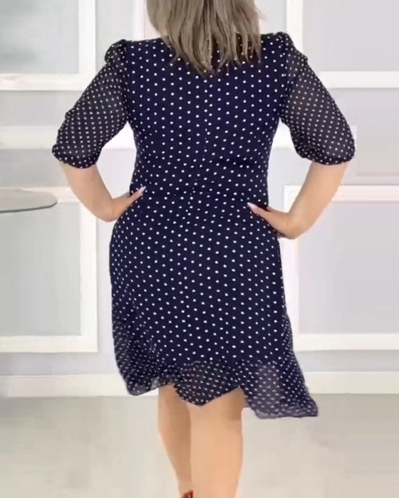Elegant half-sleeve dress with polka dot print