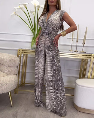 Deep V twist printed sleeveless jumpsuit