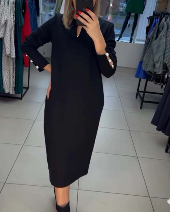 Elegant dress with pearl buttons