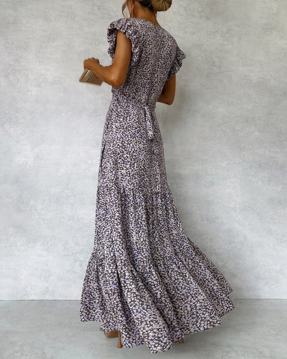 Elegant dress with ruffled sleeves and slit