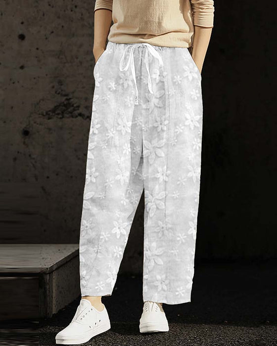 Floral embroidered lace-up solid color casual pants