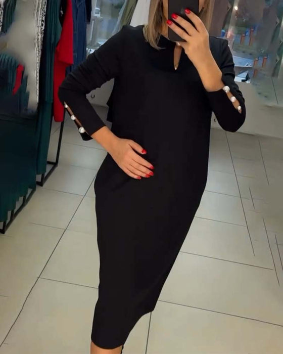 Elegant dress with pearl buttons