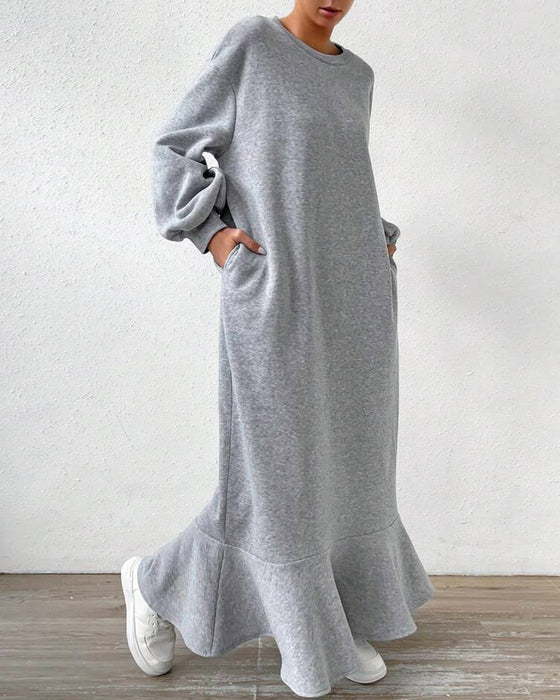 Loose dress with long sleeves and pockets