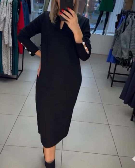Elegant dress with pearl buttons