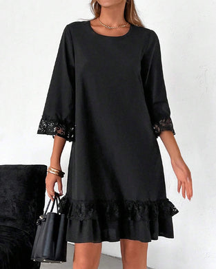 Elegant dress with lace panels