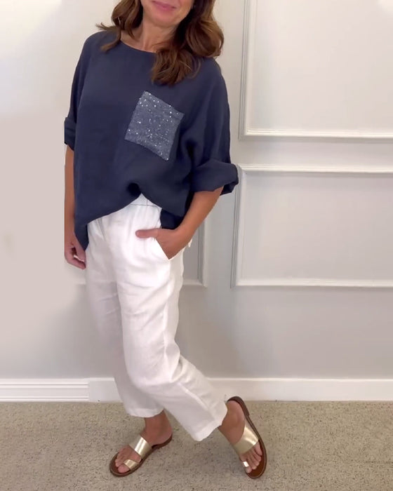 Paneled sequin pocket crew neck top