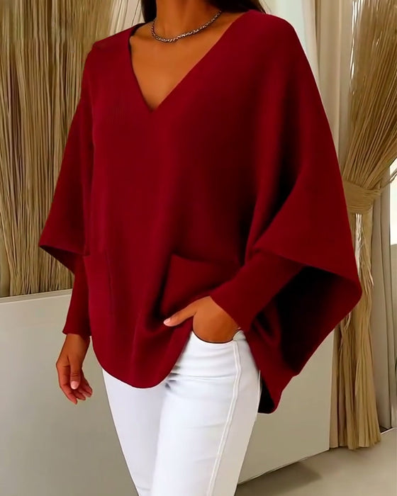 Long Sleeves With Pockets And A V-Neck Jumper